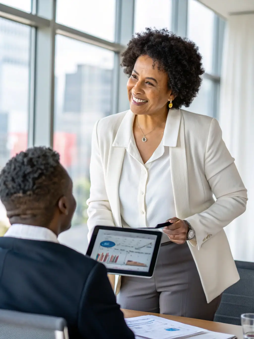 A South African entrepreneur receiving financial advice and support, highlighting the importance of strategic financial planning for business growth and success.